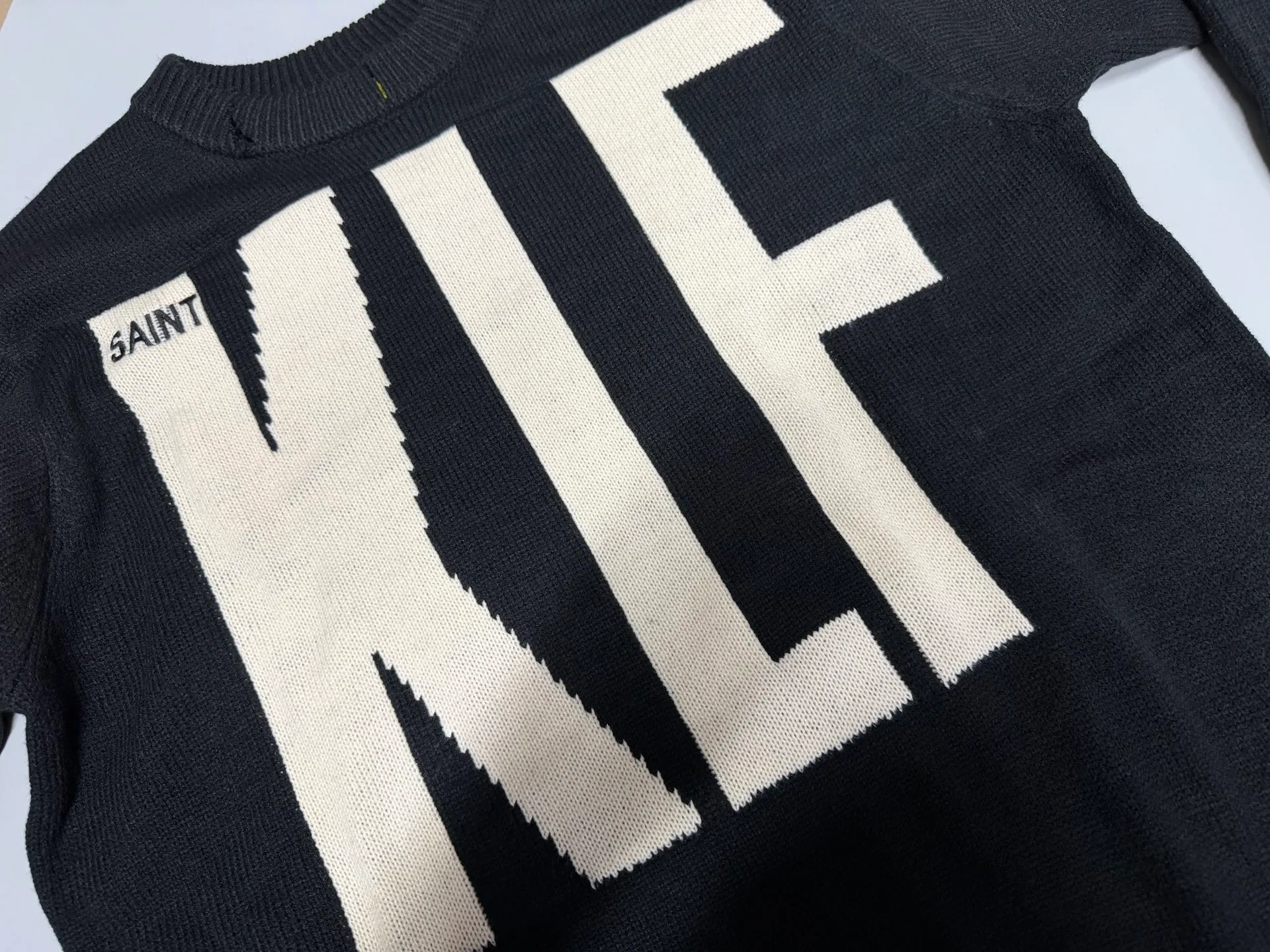 ❥4040#P240 New Saint Michael ✖️ KLF destroyed sweater made of black sheepskin material, KLF saint embroidery on the front, super visual impact! Distressed design, full of street feel, same style for men and women, a must-have for autumn and winter wear. Dark style + unique artistic sense, fashionable people and celebrities are picking it up, it looks cool if you wear it casually! Craftsmanship: The whole piece is cut and aged by hand, very slow! Weight: 900g Color: Black Size: S M L XL